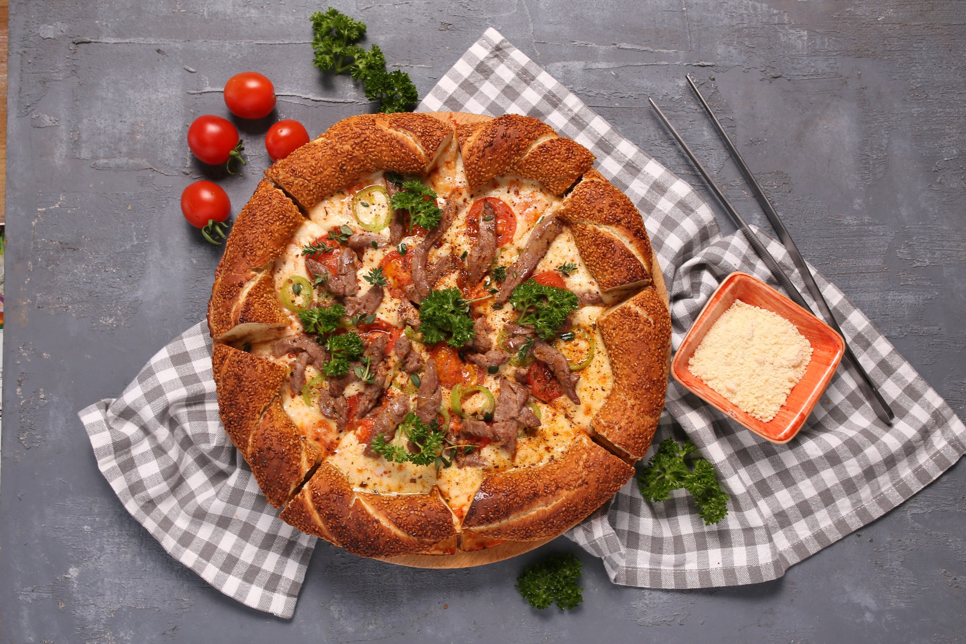 Overhead rustic pizza with table props