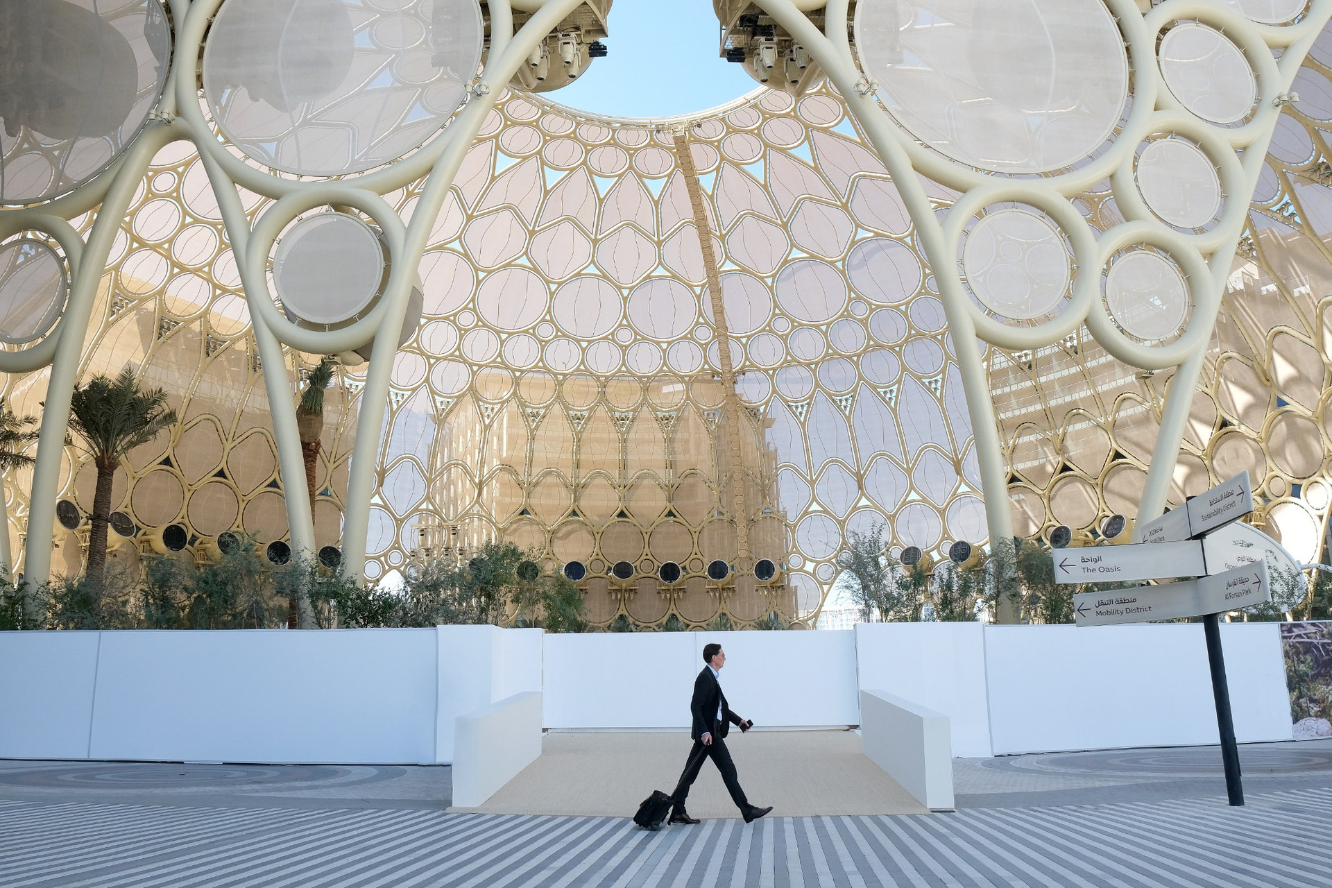 Geometric white circular canopy with person
