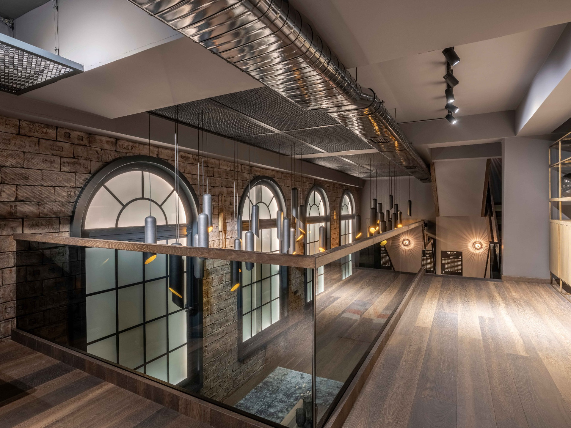 Interior with arched windows and metal services