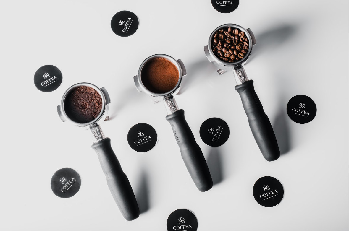 Overhead espresso portafilters and coffee beans